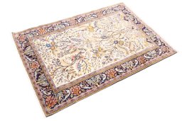 Corner detail of 2000s Ghom rug showing border pattern and Wool pile