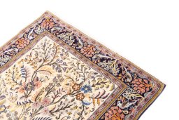 Surface texture of 2000s Ghom rug with natural Wool and intricate pattern