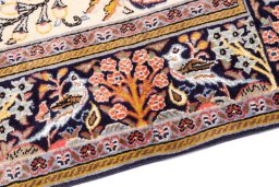 Backside of handmade 2000s Ghom rug showing knot structure and weave density