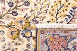 Close-up detail of 2000s Ghom rug from Iran / Persia showing Wool weave