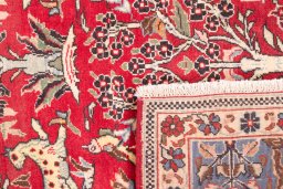Close-up detail of 1988s Ghom rug from Iran / Persia showing Wool weave