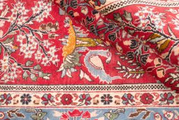 Corner detail of 1988s Ghom rug showing border pattern and Wool pile