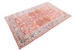 Corner detail of 1975s Ghom rug showing border pattern and Wool pile