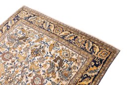 Surface texture of 1970s Ghom rug with natural Wool and intricate pattern