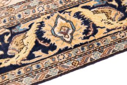 Backside of handmade 1970s Ghom rug showing knot structure and weave density