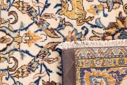 Close-up detail of 1970s Ghom rug from Iran / Persia showing Wool weave