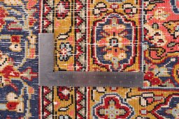 Corner detail of 1972s Ghom rug showing border pattern and Wool pile