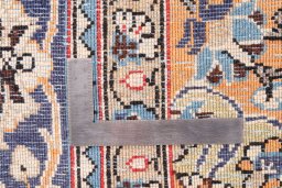 Close-up detail of 1975s Ghom rug from Iran / Persia showing Wool weave