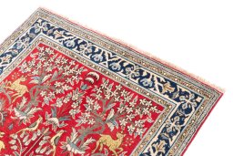 Surface texture of 1985s Ghom rug with natural Wool and intricate pattern