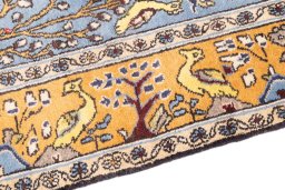Backside of handmade 1988s Ghom rug showing knot structure and weave density
