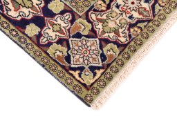 Central medallion detail of 1979s Ghom rug from Iran / Persia