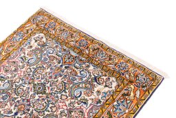Surface texture of 1998s Ghom rug with natural Wool and intricate pattern