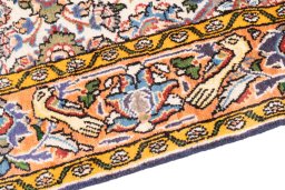 Backside of handmade 1998s Ghom rug showing knot structure and weave density