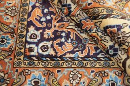 Close-up detail of 1990s Ghom rug from Iran / Persia showing Wool weave