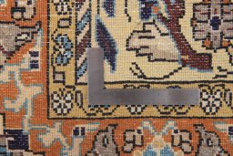 Surface texture of 1990s Ghom rug with natural Wool and intricate pattern