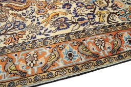 Backside of handmade 1990s Ghom rug showing knot structure and weave density
