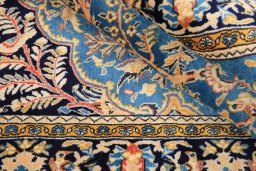 Corner detail of 1990s Ghom rug showing border pattern and Wool pile