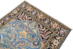 Surface texture of 1990s Ghom rug with natural Wool and intricate pattern