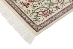 Backside of handmade New Ghom rug showing knot structure and weave density