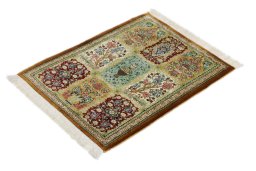 Corner detail of New Ghom rug showing border pattern and Silk pile