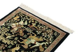 Surface texture of New Ghom rug with natural Silk and intricate pattern