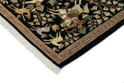 Backside of handmade New Ghom rug showing knot structure and weave density