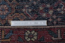 Close-up detail of 2000s Hoseinabad rug from Iran / Persia showing Wool weave