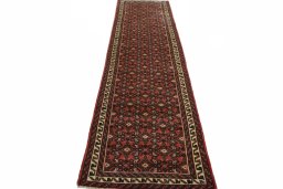 Surface texture of 2000s Hoseinabad rug with natural Wool and intricate pattern
