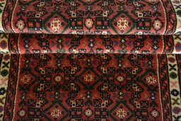 Full view of 2000s Hoseinabad rug from Iran / Persia, 286 × 73 cm in Red tones