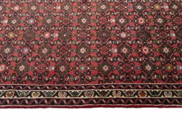 Close-up detail of New Hoseinabad rug from Iran / Persia showing Wool weave