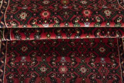 Full view of New Hoseinabad rug from Iran / Persia, 590 × 77 cm in Red tones