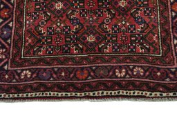 Central medallion detail of New Hoseinabad rug from Iran / Persia