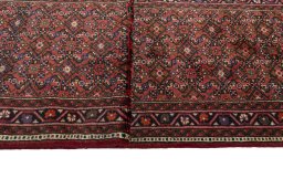 Close-up detail of New Hoseinabad rug from Iran / Persia showing Wool weave