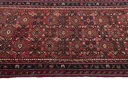 Close-up detail of New Hoseinabad rug from Iran / Persia showing Wool weave