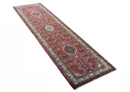 Close-up detail of 2000s Hoseinabad rug from Iran / Persia showing Wool weave