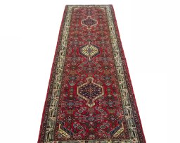 Surface texture of 2000s Hoseinabad rug with natural Wool and intricate pattern
