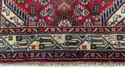 Central medallion detail of 2000s Hoseinabad rug from Iran / Persia