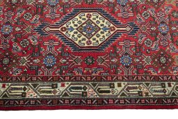 Close-up detail of 2000s Hoseinabad rug from Iran / Persia showing Wool weave