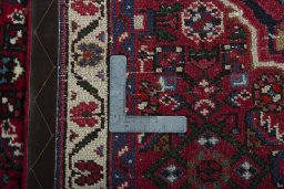 Close-up detail of New Hoseinabad rug from Iran / Persia showing Wool weave