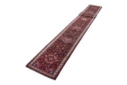 Corner detail of New Hoseinabad rug showing border pattern and Wool pile