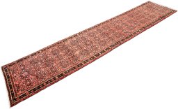 Corner detail of 1990s Hoseinabad rug showing border pattern and Wool pile