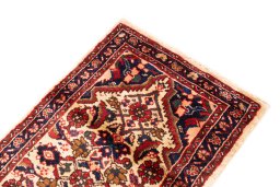 Close-up detail of 1998s Hoseinabad rug from Iran / Persia showing Wool weave
