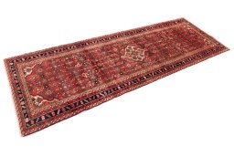 Close-up detail of 1972s Hoseinabad rug from Iran / Persia showing Wool weave