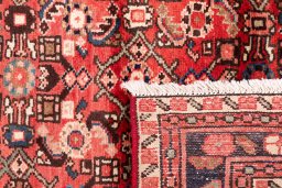 Close-up detail of 1972s Hoseinabad rug from Iran / Persia showing Wool weave