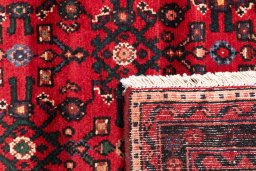 Close-up detail of 2000s Hoseinabad rug from Iran / Persia showing Wool weave