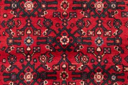 Full view of 2000s Hoseinabad rug from Iran / Persia, 412 × 82 cm in Red tones