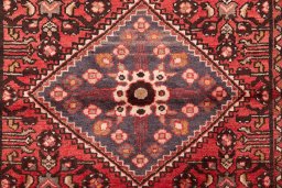 Full view of 1975s Hoseinabad rug from Iran / Persia, 305 × 102 cm in Terracotta tones