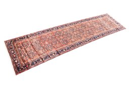 Corner detail of 1975s Hoseinabad rug showing border pattern and Wool pile