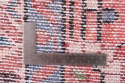 Close-up detail of 1997s Hoseinabad rug from Iran / Persia showing Wool weave