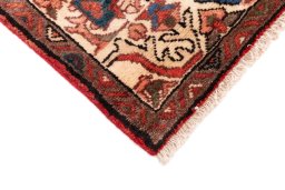 Central medallion detail of 1997s Hoseinabad rug from Iran / Persia